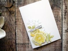 a close up of a card with flowers on it