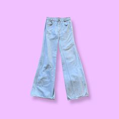 "Super cute Disco Jeans!! 100% Cotton Jeans! Super cute light-wash. Bell-bottoms.  Measurements:  Waist: 28\" Hips: 37\" Rise: 11\" Thigh: 8.5\" Inseam: 34\" Leg Opening: 22\" Condition: small pink dot stain on front, smaller than penny size. and staining on pocket but very light" Light Wash Flare Cotton Jeans, Flare Light Wash Cotton Jeans, Light Wash Flare Jeans In Cotton, Spring Light Wash High Rise Flare Jeans, Light Blue Washed Jeans For Spring, Spring Light Blue Washed Jeans, Vintage Washed Blue Flare Jeans For Spring, Vintage Washed Blue Spring Flare Jeans, Casual Light Wash Flare Jeans For Spring