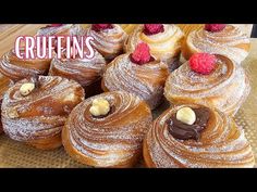 some very tasty looking pastries with raspberries on top