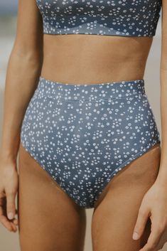 Discover your new favorite pair of full-coverage swim bottoms with our Pacific High-Waisted Bottoms. These modest floral bikini bottoms are crafted from a beautiful navy blue material that's incredibly comfortable and built to last. These modest high-waisted bottoms are perfect for an active day in the water. The blue and white ditsy floral women's swimsuit is the cutest bikini for any occasion. What makes them the best pair of bottoms you'll ever own? These bottoms feature our higher-leg cut Green Bean Outfit Ideas, Green Bean Outfit, Pool Party Attire, Modest Swimwear For Women, Cute Modest Swimwear, Modest Bikinis, Athletic Bikinis, Modest Tankini, Swimsuit Inspo