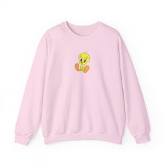 Indulge in the cozy, childhood-like joy with our Tweety Bird Looney Toons Sweatshirt! This charming unisex sweatshirt is the perfect blend of comfort and nostalgia, crafted from a soft and durable blend of 50% cotton and 50% polyester. Featuring medium-heavy fabric (8.0 oz/yd² or 271.25 g/m our sweatshirt provides warmth without feeling overly heavy, making it suitable for various seasons. With its loose fit design and ribbed knit collar, it offers a relaxed and stylish look while retaining its Tweety Bird, Childhood Nostalgia, Looney Tunes, Knit Collar, Sew-in Labels, Heavy Fabric, Unisex Sweatshirt, Ribbed Knit, Loose Fitting