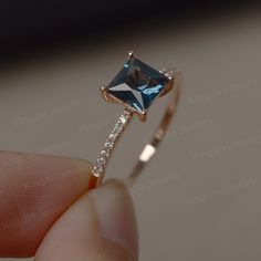 This is a gorgeous handmade creation. Its beauty is its simplicity & Elegance. The 6*6mm princess cut London blue topaz is crafted in solid 14k gold. It is available to customized, if you have any mind, just let me know, we will discuss with it. All item is sent in a beautiful gift box You can realize more lovely stuff clicking the link https://www.etsy.com/shop/knightjewelry?refshopsection_shophome_leftnav Please leave the correct address and you PHONE NUMBER for delivering successfully. Ring Princess Cut, Gold Ring For Women, Ring Rosegold, London Blue Topaz Ring, Princess Cut Rings, November Birthstone, Blue Topaz Ring, London Blue Topaz, Favorite Rings