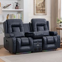 two reclining chairs sitting next to each other in a living room