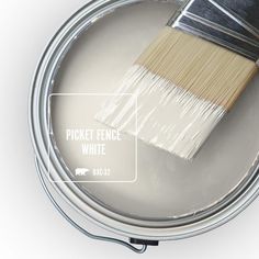 a paint can with a brush in it and labeled natural twine on the side