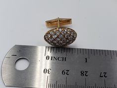 Title: Set of Oval Gold Cufflink with Pave Diamonds 14KT Yellow Gold Designer: NONE MaterialYellow Gold 14kt Stamped Style: Vintage All measurements are approximate and may vary slightly from the listed dimensions. 82 Diamonds of 2.4 mm approx. each Round 4.10 CT approx. Color : G-H Clarity: VS Estimated Measurements19.36mm x 14.60mm x 5.38mm Estimated Total Weight of the Item : DWT: 7.5 Grams: 11.6 ConditionPre-owned- In Very Good Condition -light Scratches. Dealer number EE0000130-CL PLEASE LO Elegant Oval Cufflinks For Business, Classic Oval Cufflinks For Business, Luxury Oval Cufflinks For Formal Occasions, Designer Brilliant Cut Formal Jewelry, Designer Jewelry With Brilliant Cut For Formal Occasions, Yellow Gold Round Cufflinks For Formal Occasions, Luxury Diamond Cufflinks For Anniversary, Luxury Hallmarked Cufflinks For Anniversary, Designer Formal Jewelry With Single Cut Diamonds