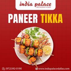 an advertisement for paneer tikka with chicken and vegetables on skewered skewers