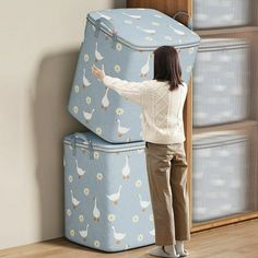 a woman standing next to two large suitcases