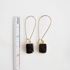 Where the timeless elegance meets modern vibes, that's where you'll find these drop earrings. GEMSTONE: Black Onyx CLOSURE: Gold plated kidney ear wires LENGTH: 2" long Earrings Gemstone, Earrings In Gold, Modern Vibe, Black Onyx, Ear Wires, Onyx, Timeless Elegance, Gold Plate, Plating