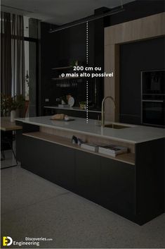 an image of a modern kitchen with black cabinets and white counter tops, along with the words 200 cm out