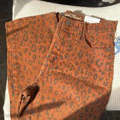 Size 4/27r Animal Print Trendy Stretch Brown Jeans, Trendy Brown Stretch Jeans, Brown Stretch Jeans For Summer, Summer Stretch Brown Jeans, Spring Stretch Brown Jeans, Brown Stretch Jeans For Spring, Spring Brown Stretch Jeans, Cream Jumpsuit, Chambray Romper