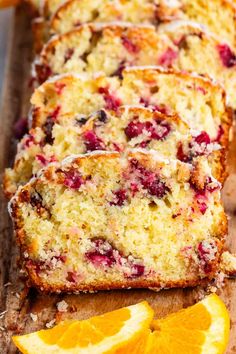 slices of cranberry orange bread on a cutting board