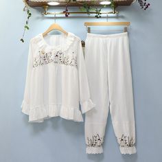 The Flowered Cotton Spring Pajamas includes a long sleeve top and trousers and is the perfect set to buy when you want to feel relaxed and in peace in the comfort of your house! We are passionate about fabric and textile materials and have thus created the best, most comfortable yet practical line of pajamas. This loungewear is all you need to help relax at home. They are soft and easy to touch which projects versatility and effortless grace in every step you take. Made to make you feel good, ea Spring Pajamas, Lounging Outfit, Body Condition, Women's Fashion Set, Comfortable Pajamas, Every Step You Take, In Peace, Knitting Materials, Fashion Essentials