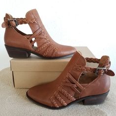 New Lucky Brand Brown Leather Block Heel Booties In Beautiful Warm Brown Color Called "Umber". Style Is Called "Forbas". Amazing Bootie With Open Sides That Are Accented By Multiple Braided Leather Straps And Criss-Crossing For A Very Unique Style! Adjustable Buckle Closure, Tr Rubber Outsole, And 1.57" Block Heel. Brand New In Box! Spring Brown Faux Leather Booties, Spring Leather Booties With Buckle Closure, Spring Closed Toe Faux Leather Booties, Casual Leather Booties With Buckle Closure, Spring Leather Closed Toe Booties, Leather Closed Toe Booties For Spring, Brown Leather Booties For Spring, Spring Leather Booties With Heel Pull Tab, Brown Spring Booties With Buckle Closure