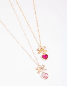 Mixed Metal Heart & Bow Necklace Pack - Lovisa Pink Heart-shaped Jewelry With Clavicle Chain, Pink Heart-shaped Clavicle Chain Jewelry, Pink Heart Pendant Charm Necklace For Mother's Day, Pink Heart Charm Round Pendant Jewelry, Pink Clavicle Chain Necklace For Valentine's Day, Pink Round Pendant Jewelry With Heart Charm, Pink Round Pendant With Heart Charm, Pink Charm Necklace For Gifts, Rose Gold Heart Charm Jewelry As Gift