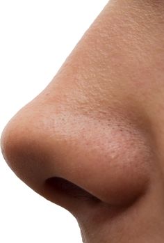 a close up view of the nose of a woman