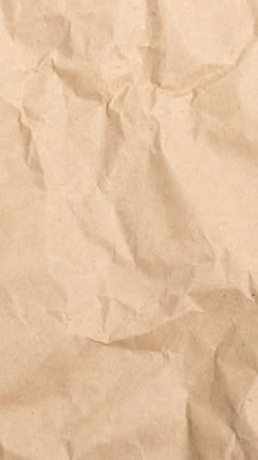 a piece of brown paper that has been wrinkled