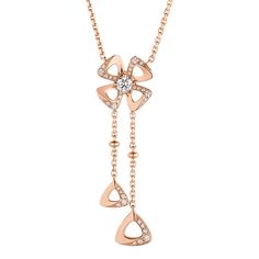 This is part of Chairish’s Fine Jewelry assortment.  BVLGARI Fiorever Diamonds 18k Rose Gold Necklace   The Bvlgari Fiorever necklace is a captivating piece of jewelry that exudes high elegance. Crafted in exquisite 18K rose gold, it features a delicate chain adorned with a dazzling flower shaped pendant. The pendant is embellished with brilliant diamonds, symbolizing everlasting beauty and grace.    Material: Rose Gold   This item has been used and may have some minor flaws. Before purchasing, please refer to the images for the exact condition of the item.  We cannot confirm the time period listed.  A return request must be submitted within 48 hours after delivery. Customer is responsible for return shipping costs and fees. Estimated return shipping costs for this item are $80. Contact Ou Luxury Rose Gold Necklace With Rectangular Links, Luxury Rose Gold Link Necklace, Luxury Gold-tone Chain Necklace For Evening, Gold Rhinestone Metal Necklace, Luxury Gold Rhinestone Metal Necklace, Delicate Chain, Time Period, Rose Gold Necklace, Brilliant Diamond