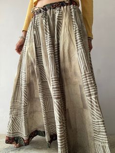 "This is beautiful traditional Indian style lehenga skirt Maxi loose and wide, frilled extra tall skirt  Super comfortable with natural look flared, made in soft cotton with block print patterns  full length with elastic waist  one of a kind  MEASURE Size M Waist 27-35\" Length 39\" MATERIAL *block print cotton *cotton inner lining  Thak You for looking" Beige Cotton Flared Maxi Skirt, Beige Flared Cotton Maxi Skirt, Bohemian Floor-length Lehenga For Summer, Bohemian Floor-length Summer Lehenga, Summer Bohemian Long Skirt Lehenga, Summer Bohemian Long Lehenga, Bohemian Long Skirt Lehenga For Navratri, Bohemian Long Lehenga For Navratri, Bohemian Cotton Skirt With Batik Print