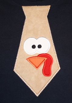 Looking for a cute shirt for your little one this Thanksgiving holiday? Why not dress him up in a turkey tie t-shirt. Available in the colors shown, but we can customize them to fit your needs. ***Name can be added for $5.00.******Matching pants available for an additional cost. Shipping will be slightly more if you order an outfit.******When ordering please include your t-shirt size and color (we will do our best to find the color that you want), fabric choice, thread color, and font and name i Christmas Craft Night Ideas, Tshirt Applique, Christmas Craft Night, Thanksgiving Costume, Christmas Shoebox, Craft Night Ideas, Shoebox Ideas, Tie T Shirt, Kids Thanksgiving