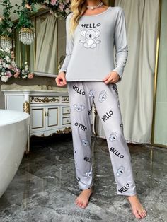 Elevate your relaxation game with our Koala And Letter Graphic PJ Set. Embrace comfort in style with this 2-piece pant set featuring charming cartoon and letter patterns. Experience unrestricted movement with the loose fit and long sleeves. Crafted from a blend of 95% Polyester and 5% Elastane, it offers a slight stretch for a cozy feel. Effortlessly maintain its allure through machine wash or professional dry cleaning. Your perfect loungewear companion awaits! Features: Pattern Type: Cartoon, L Types Of Lettering, Pajama Set Women, Pj Sets, Letter Patterns, Pajama Sets, Pant Set, Black Border, Pajamas Women, Koala