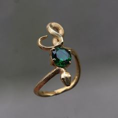 Snake Emerald Gold Plated Ring, 925 Sterling Silver Ring, Emerald Gold Snake Silver Ring, Emerald Snake Silver Ring, Animal Snake Jewelry - Etsy Luxury Fine Jewelry Yellow Gold Snake Ring, Unique Gemstone Snake Ring For Promise, Green Snake Ring For Gift, Green Snake Ring Gift, Unique Round Snake Ring Gift, Unique Sterling Silver Emerald Ring With Gold Plating, Unique Gold Emerald Ring In Sterling Silver, Unique Sterling Silver Emerald Ring Collectible, Unique Collectible Sterling Silver Emerald Ring