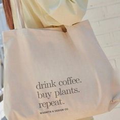 "☕ Love coffee? Adore plants? Repeat the cycle with our \"Drink Coffee. Buy Plants. Repeat.\" Tote Bag! This reusable shopping bag is a delightful pick for both coffee enthusiasts and plant lovers. It's not just a stylish accessory; it's also an ideal Gift for plant lovers, whether she's a book club member, or needs a tote bag for school. 🌿🛍️ 🌱 Key Features: 👜 Sturdy and spacious Tote Bag ☕ \"Drink Coffee. Buy Plants. Repeat.\" design 🎁 Perfect Gift for Plant moms and coffee enthusiasts alike 📚 Great for book clubs or as a Tote bag for school 🌱 Embrace your love for coffee, plants, and the cycle of joy with this versatile Tote Bag. It's a chic and eco-friendly way to express your passion! ☕🌿 FAQs: 1. What are the dimensions of this Tote Bag? The Tote Bag measures approximately 15 i Casual Natural Canvas Bag For Gifts, Organic Reusable Bag For Everyday Use, Large Capacity Natural Canvas Bag Gift, Large Capacity Natural Canvas Bag, Ideal For Gifts, Natural Large Capacity Canvas Bag For Gifts, Large Capacity Natural Canvas Bag As Gift, Organic Reusable Canvas Bag For Everyday Use, Recyclable Tote Canvas Bag For Gifts, Organic Everyday Reusable Canvas Bag