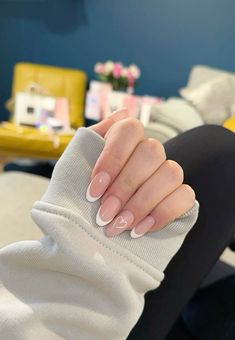 Heart nails, french tip, oval nail Oval French Tip Nails With Heart, French Nail Heart, French Too With Heart, French Tip Almond With Heart, Oval Nail Designs Ideas, White French With Heart, French Tip Nails With Heart Design, French Nails With Heart Design, French Tips With Small Heart