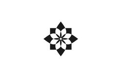 an abstract black and white flower logo