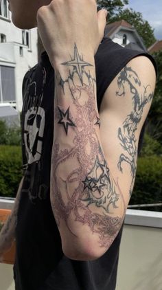 a man with a tattoo on his arm