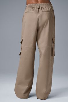 Landing the perfect pair of statement pants can be tricky, which is why we made the Night Out Cargo Trousers. Done in crisp yet soft cotton twill, they have front pleats for a touch of volume, oversized cargo pockets, and dramatic, baggy legs. And zoom in on the waistband—it’s tailored in front and stretchy in back for a comfortable, custom-to-you fit. Seal the deal with the coordinating Night Out Cargo Jacket. Statement Pants, Gray Accessories, Cargo Jacket, Womens Capris, Tank Top Long Sleeve, Cargo Trousers, Sweaters Knitwear, Long Sleeve Crop Top, Bra Tops