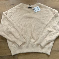 Nwt Zara Teddy Bear Sweater Perfect Fuzz Cozy Soft Fuzzy Sweater Cream /Tan Crew Neck Sweater Size Large Fits Really Cute Especially If You Wear A Bit Oversized #Teddy Bear Sweater #Fuzzy Sweater #Zara #Cozy Zara Beige Soft Knit Sweater, Trendy Beige Sweater With Soft Texture, Trendy Soft Textured Beige Sweater, Trendy Cream Zara Sweater, Trendy Zara Cream Sweater, Zara Trendy Cream Sweater, Cozy Beige Zara Sweater, Neutral Zara Top For Winter, Trendy Zara Soft Knit Tops