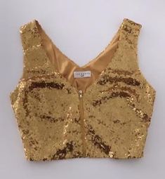 Sleeveless Sequin Crop Top (FREEGIFT ITEM) – TiaBhuva.com Summer Party Tops With Zipper Closure, Fitted Crop Top With Zipper For Party, Summer Party Crop Top With Zipper Closure, Fitted Crop Top With Zipper Closure For Party, Gold Sleeveless Blouse Piece For Party, Gold Sleeveless Blouse Piece For Festivals, Traditional Gold Sequined Tops, Sleeveless Contrast Sequin Crop Top For Party, Fitted Party Crop Top With Zipper Closure