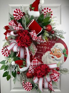 a christmas wreath with santa clause and candy canes