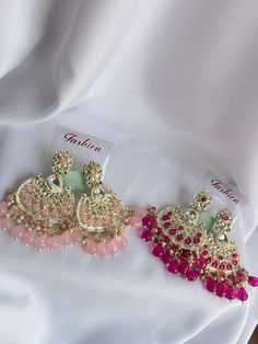 [ELEGANT DESIGN] These Indian Jhumka earrings feature a beautiful combination of gold ,light pink and hot pink color, perfect for traditional wear. - [HIGH QUALITY] Made with high quality materials to ensure durability and long-lasting shine. - [LIGHTWEIGHT] Comfortable to wear all day for any occasion. - [VERSATILE] Perfect for pairing with traditional Indian outfits or adding a touch of elegance to any outfit. Elegant Pink Stone Work Danglers, Elegant Pink Earrings With Stone Work, Rose Gold Drop Earrings For Festive Occasions, Elegant Pink Danglers With Stone Work, Elegant Pink Bridal Earrings With Stone Work, Festive Rose Gold Earrings For Gift, Elegant Pink Jhumkas With Stone Work, Pink Stone Work Earrings For Wedding, Pink Drop Earrings Jewelry For Diwali