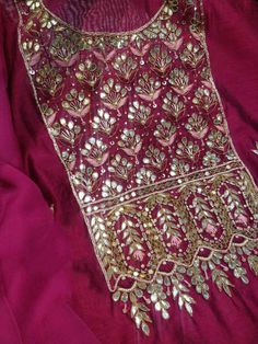 Item Overview ATHARVA Hand Embroidery Salwar Kameez w/Embroidery Neck Maroon/Banarsi Silk Dupatta/Gota Patti/ Custom Stitch/Anarkali/Patiala/ Dno. CH1556 Fabric: * Shirt- Chanderi Silk - Embroidered Neck- Maroon - 2.5 Mts Beautiful Hand Embroidery * Dupatta: Banarsi Silk Dupatta-Tilla Border Dupatta- 2.5 Mts- Latkans Tassels- (Motifs may wary) * Bottom Santoon Silk 2.5 Mts. Excusive Hand Embroidered Party Wear Punjabi Suit. Customization: * Fabrics Customization: Designs Can be made in different Patiala Salwar Kameez, Embroidered Pants, Patiala Salwar, Silk Dupatta, Thread Work, Embroidered Silk, Different Fabrics, Salwar Kameez, Anarkali