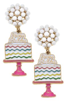 Celebrate in style with our Birthday Cake Enamel Earrings in White. These earrings are the perfect accessory for any birthday outfit, adding a touch of sweetness to your look. They are durable and will make the perfect gift for yourself or a loved one. White Enamel Jewelry For Party, Playful Nickel-free Earrings For Birthday, Sweet White Earrings For Birthday, Cute Drop Earrings For Birthday, Fun White Party Jewelry, Playful White Earrings For Party, Cute Birthday Jewelry With Matching Earrings, Nickel-free Earrings For Birthday, Gold Earrings For Birthday