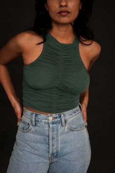 Woodrose deli cool breeze ruched tank top in buttery flattering material. its asymmetrical neckline exudes modern charm.    measurements:    - xs- chest width 24" length 14"  - s- chest width 26" length 14.5"  - mchest width 28" length 15"    pipe and row Ruched Tank Top For Night Out, Versatile Ruched Tops For Spring, Flattering Fitted Sleeveless Top, Chic Stretch Tank Top With Ruched Back, Summer Stretch Tank Top With Ruched Back, Fitted Casual Top With Ruched Back, Fitted Green Ruched Tops, Stretch Tank Top With Ruched Back For Summer, Casual Fitted Top With Ruched Back