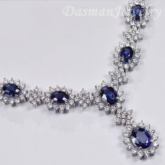 For the truly sophisticated connoisseur, this tanzanite diamond necklace makes a spectacular statement on elegance and artistry! It will be professionally handmade of solid 14 karat white gold, and highly polished for a very shiny smooth look. The links are 4-prong set with natural violet-blue oval-cut tanzanites, all totaling approximately 11.37 carats. They're haloed by 6.25 carats of gleaming white round brilliant-cut genuine diamonds (VS2-SI1 clarity, F-G color). Our women's gemstone necklac Luxury Gold Tanzanite Necklace, Luxury Sapphire Necklace For Formal Occasions, Luxury Tanzanite Necklace With Brilliant Cut, Luxury Sapphire Necklace For Party, Fine Jewelry Sapphire Necklaces For Party, Fine Jewelry Sapphire Necklace For Party, Fine Sapphire Necklaces For Party, Fine Sapphire Necklace For Party, Luxury Oval Tanzanite Necklaces