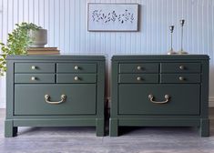 two green dressers side by side with brass handles