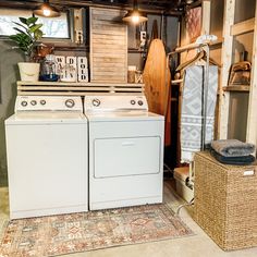 a washer and dryer sitting in a room next to each other on a rug