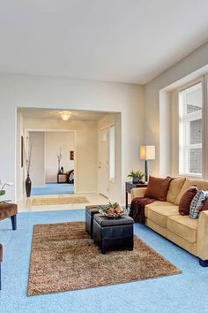 the living room is clean and ready for guests to use it as an office space