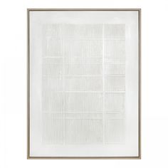 a white and gold framed painting with squares on the bottom, in front of a white wall