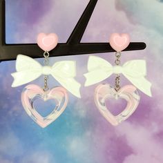 "Cute heart earrings - Valentine's Day earrings - pink and white coord - Halloween costume accessories - statement earrings - post dangle earrings - Lolitafashion Cute heart and bow earrings perfect with any pink style outfit! Stay fun and fashionable in these pink and white heart earrings.  12mm wide plastic and silicone rubber backings included for comfort **Stainless steel earring posts are hypoallergenic and nickel free Made of resin / plastic Charms are one sided and flat on the back Earrin Sweet White Jewelry For Valentine's Day, Pink Kawaii Jewelry For Valentine's Day, Kawaii Pink Jewelry For Valentine's Day, White Heart Beads Drop Earrings, Cute White Heart Earrings, White Drop Earrings With Heart Beads, Pink Harajuku Style Jewelry Gift, Playful Pink Heart Earrings For Valentine's Day, Cute Pink Heart Earrings For Birthday