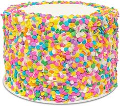 a multicolored cake with sprinkles on it