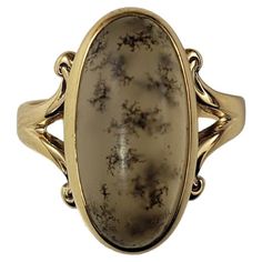 Vintage 14 Karat Yellow Gold Moss Agate Ring Size 4- This elegant ring features one moss agate - also known as picture agate - gemstone (14 mm x 8 mm) set in classic 14K yellow gold. Shank: 2 mm. Ring Size: 4 Weight: 1.6 dwt./2.6 gr. Stamped: 14K Very good condition, professionally polished. Will come packaged in a gift box or pouch (when possible) and will be shipped U.S. Priority Mail Insured. DV07082417KCS Elegant Moss Agate Rings With Natural Inclusions, Elegant Untreated Oval Gemstones, Untreated Oval Elegant Gemstones, Yellow Gold Oval Agate Jewelry, Formal Jewelry With Oval Cabochon Natural Stones, Formal Oval Cabochon Natural Stone Jewelry, Oval Yellow Gold Agate Jewelry, Elegant Oval Untreated Opal Ring, Oval Agate Yellow Gold Jewelry