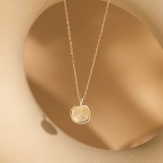 Capture cherished moments with our Fingerprint Coin Necklace, delicately shaped in a circle. Each necklace comes with a pressed circle charm, engraved with an actual fingerprint design, serving as a heartfelt tribute to love and connection. A thoughtful choice for Mother's Day, this necklace embodies the enduring beauty of maternal love, offering a timeless and meaningful gift for the special woman in your life. SKU: MM-NM144NI Product Details Material: High Quality Solid 925 Sterling Silver Fin Dainty Engraved Round Disc Charm Necklaces, Dainty Engraved Round Pendant Coin Necklace, Delicate Round Charm Necklace Tarnish Resistant, Delicate Coin Pendant Jewelry, Birth Flower Charm Necklace As Gift For Her, Birth Flower Charm Necklace For Her, Minimalist Medallion Charm Necklace For Anniversary, Delicate Round Coin Pendant Jewelry, Round Birth Flower Charm Necklace For Her