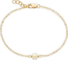 a gold chain bracelet with a white bea