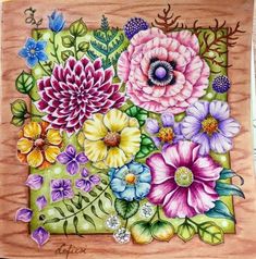 a painting of flowers on a wooden board