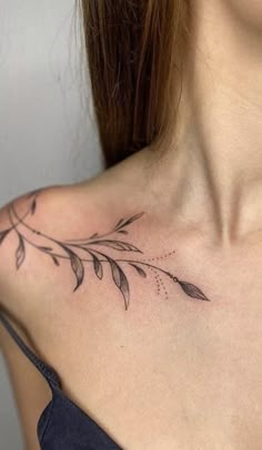 a woman with a tattoo on her chest