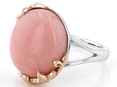 16x12mm oval pink opal rhodium and 18k rose gold over sterling silver solitaire ring. Measures approximately .55"L x .68"W. Not sizeable. Finished under gallery.